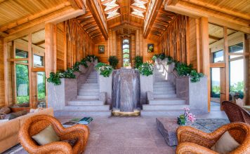 Indoor Fountains’ Majesty breathtaking-granite-grand-staircase-and-fountain-living-room-luxury-home